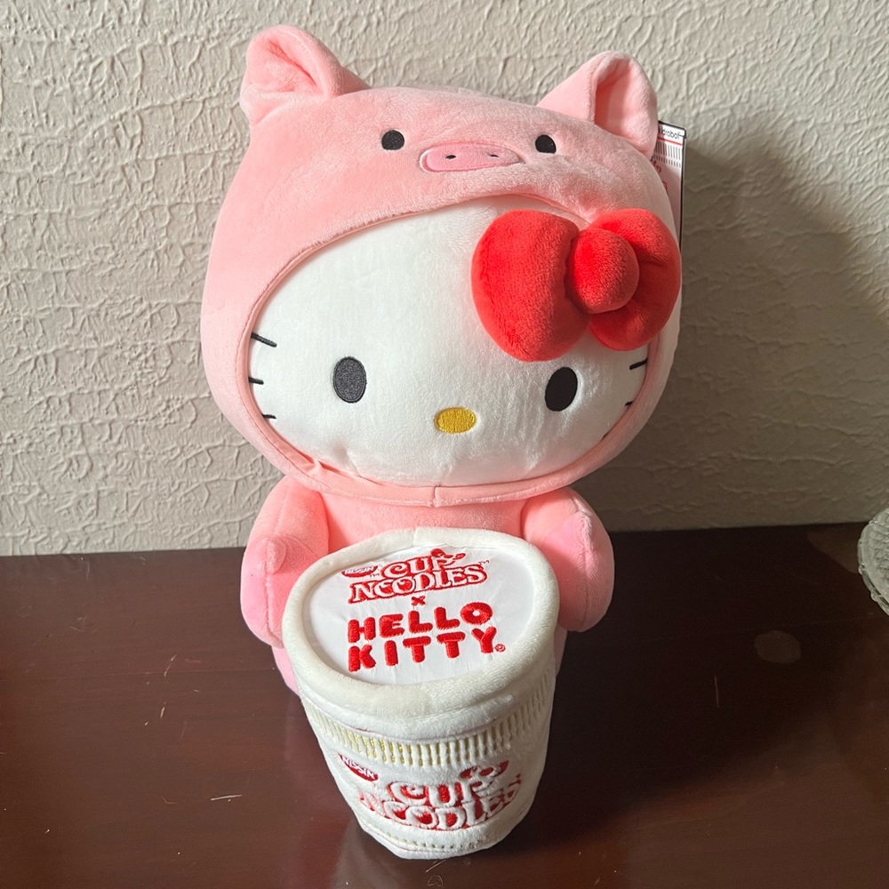 Brand new Hello Kitty x Cup Noodles plush. Hood comes down, tags still on.